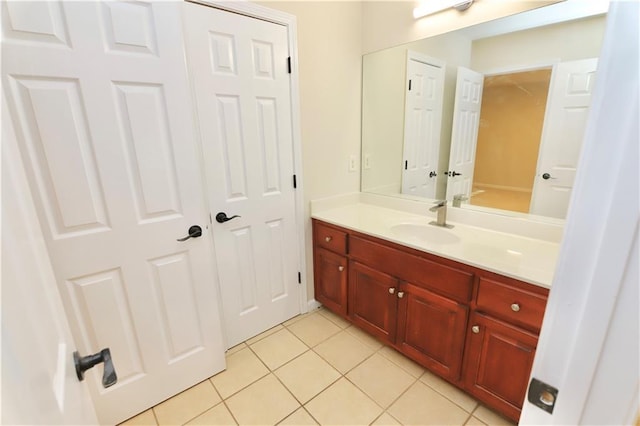 bathroom with vanity and tile patterned floors