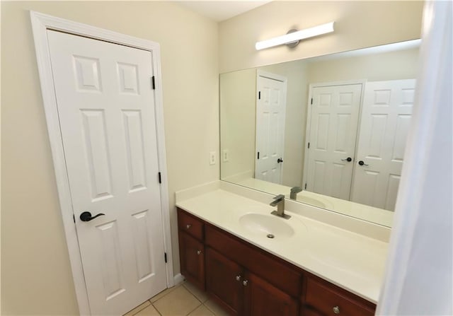 bathroom with vanity and tile patterned floors