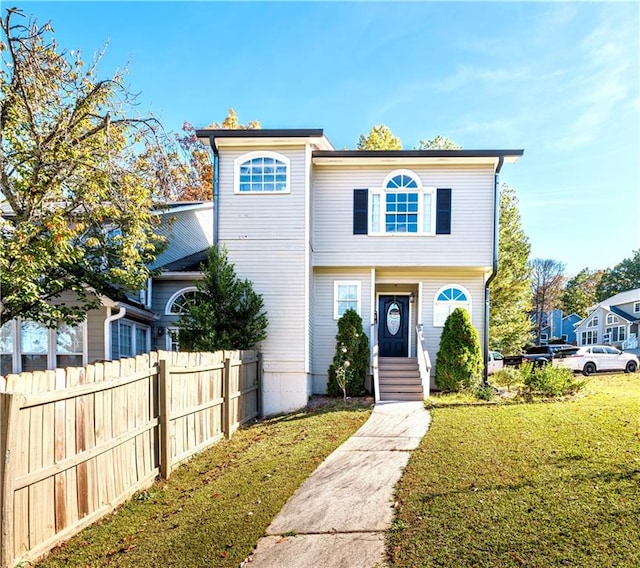 view of front facade with a front yard