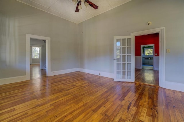 spare room featuring hardwood / wood-style floors and ceiling fan