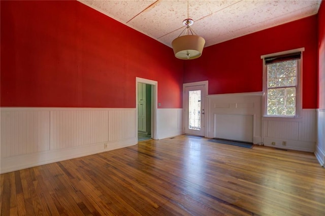 foyer featuring hardwood / wood-style flooring and plenty of natural light