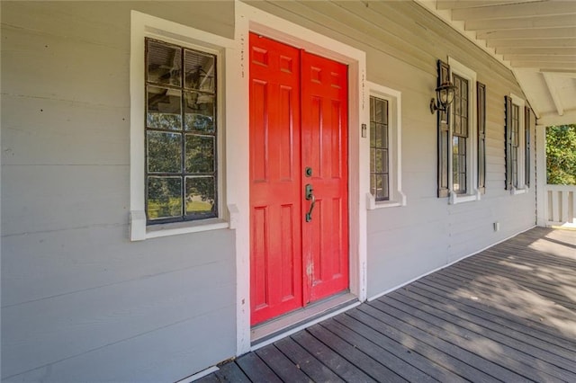 property entrance featuring covered porch