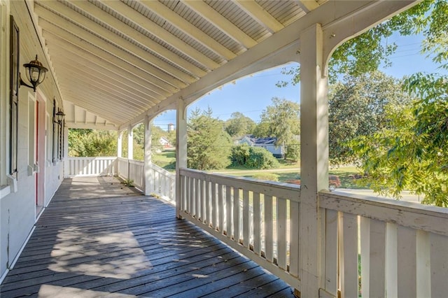 wooden terrace featuring a porch