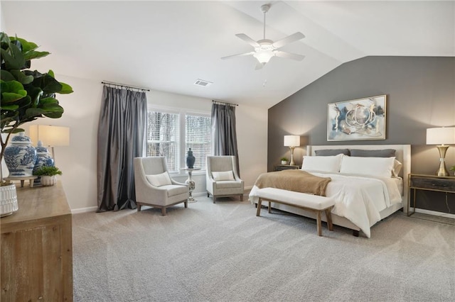 bedroom with visible vents, lofted ceiling, baseboards, ceiling fan, and carpet