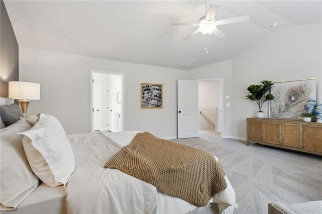 bedroom with baseboards, a ceiling fan, vaulted ceiling, and light carpet