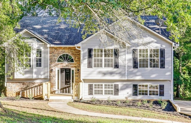 733 Wesley Chapel Rd, Villa Rica, GA 30180 - raised ranch featuring stone siding and a shingled roof