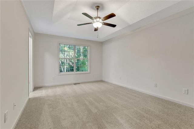 733 Wesley Chapel Rd, Villa Rica, GA 30180 - carpeted spare room with ceiling fan and a raised ceiling