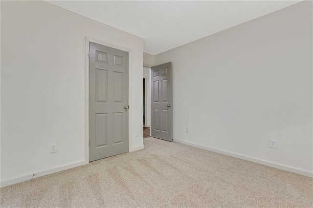 733 Wesley Chapel Rd, Villa Rica, GA 30180 - empty room featuring light carpet and baseboards