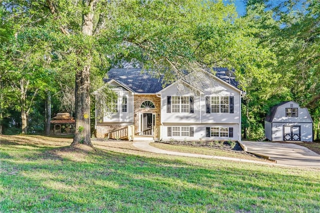733 Wesley Chapel Rd, Villa Rica, GA 30180 - bi-level home featuring a front lawn and a shed