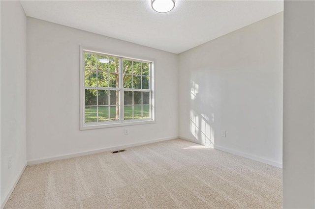 733 Wesley Chapel Rd, Villa Rica, GA 30180 - carpeted spare room featuring baseboards and a textured ceiling