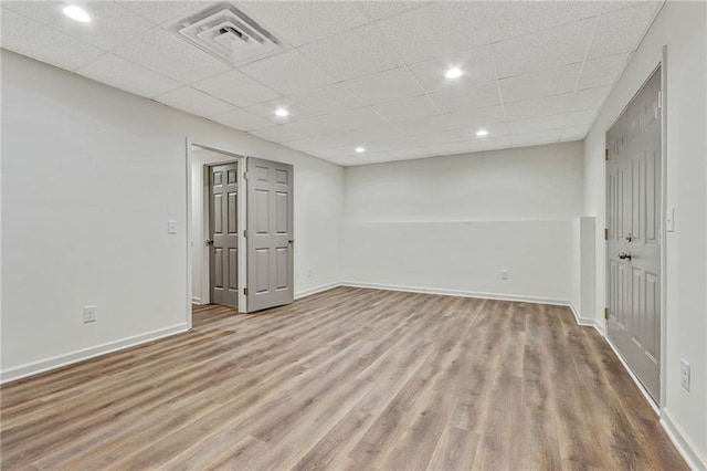 733 Wesley Chapel Rd, Villa Rica, GA 30180 - basement with wood finished floors, a drop ceiling, and recessed lighting