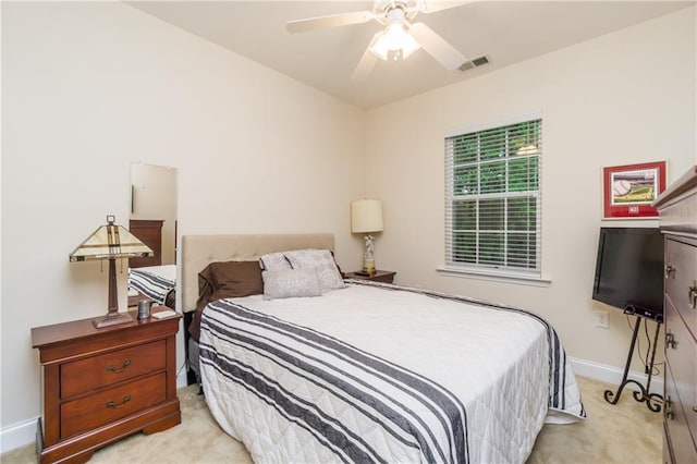 2623 Grapevine Cir Unit 602, Cumming, GA 30041 - bedroom with baseboards, visible vents, light carpet, and ceiling fan