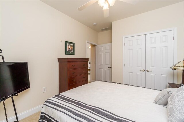 2623 Grapevine Cir Unit 602, Cumming, GA 30041 - bedroom featuring baseboards, ceiling fan, and a closet
