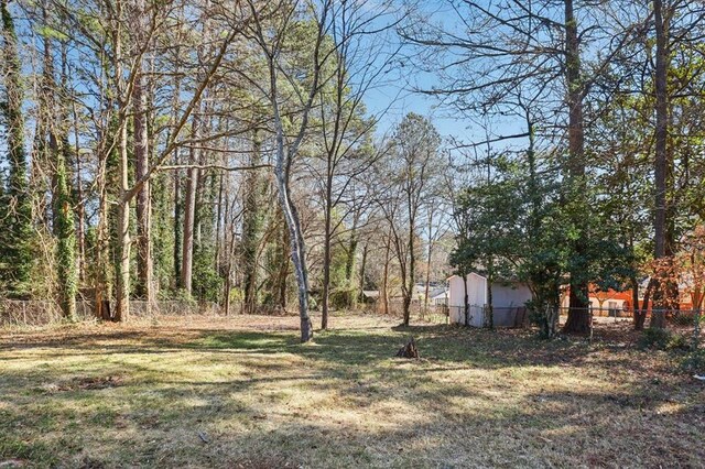 8298 Holly Dr, Jonesboro, GA 30238 - view of yard with fence