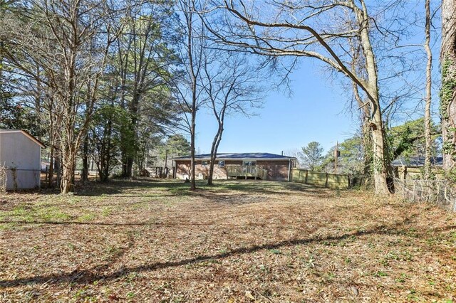 8298 Holly Dr, Jonesboro, GA 30238 - view of yard featuring fence