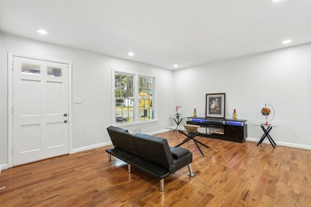8298 Holly Dr, Jonesboro, GA 30238 - office space featuring baseboards, light wood-type flooring, and recessed lighting