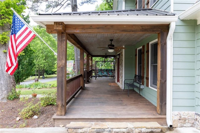 deck featuring a ceiling fan