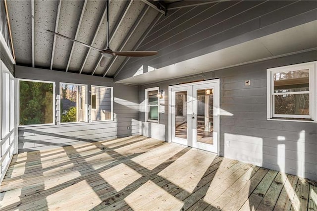 unfurnished sunroom with french doors, vaulted ceiling, and ceiling fan