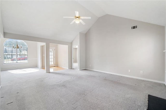 unfurnished living room featuring light carpet, high vaulted ceiling, baseboards, and visible vents