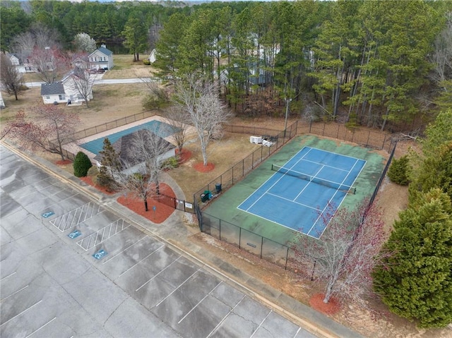 drone / aerial view featuring a forest view