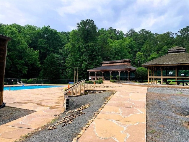 view of swimming pool with a gazebo