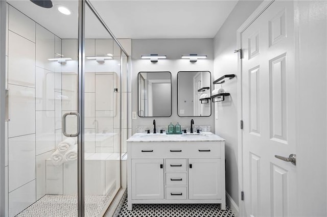1251 Pierce Ave, Smyrna, GA 30080 - full bathroom with a shower stall, double vanity, and tile patterned flooring