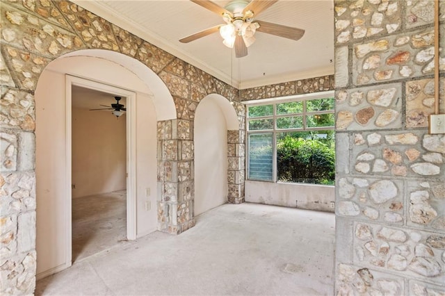 5128 Lavista Rd, Tucker, GA 30084 - unfurnished room with arched walkways, a ceiling fan, and ornamental molding