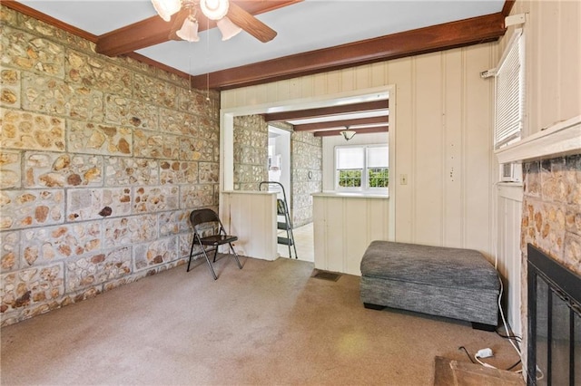 5128 Lavista Rd, Tucker, GA 30084 - sitting room with a ceiling fan, a glass covered fireplace, beam ceiling, and carpet floors