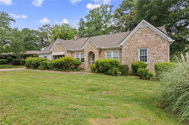 5128 Lavista Rd, Tucker, GA 30084 - single story home with a front yard, a chimney, brick siding, and roof with shingles