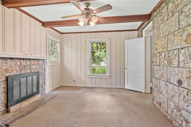 5128 Lavista Rd, Tucker, GA 30084 - unfurnished living room with beam ceiling, a glass covered fireplace, carpet flooring, a ceiling fan, and crown molding