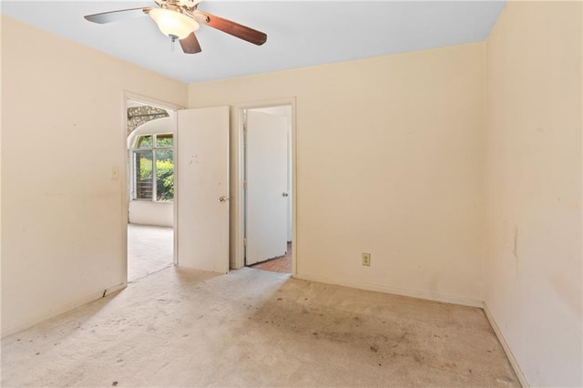5128 Lavista Rd, Tucker, GA 30084 - unfurnished room featuring light carpet, ceiling fan, and baseboards