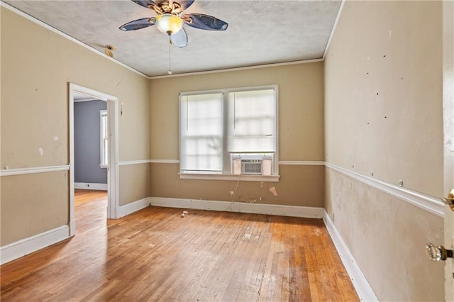 5128 Lavista Rd, Tucker, GA 30084 - spare room with wood-type flooring, a ceiling fan, ornamental molding, cooling unit, and baseboards