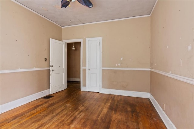 5128 Lavista Rd, Tucker, GA 30084 - spare room featuring a ceiling fan, hardwood / wood-style floors, ornamental molding, and baseboards