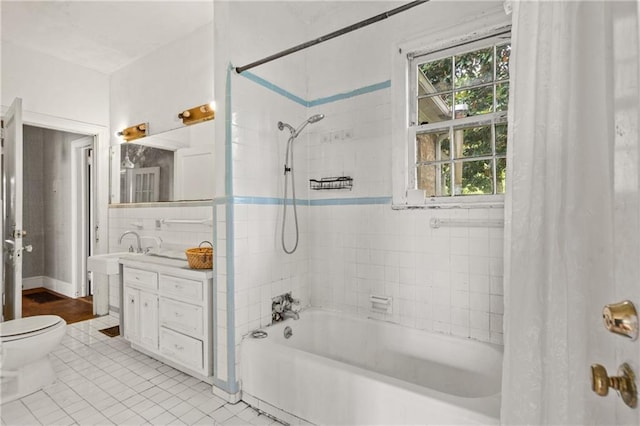 5128 Lavista Rd, Tucker, GA 30084 - bathroom with shower / bath combo with shower curtain, vanity, tile patterned flooring, and healthy amount of natural light