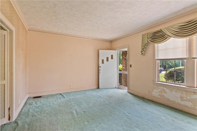 5128 Lavista Rd, Tucker, GA 30084 - carpeted spare room featuring baseboards, a textured ceiling, and crown molding