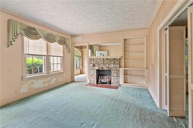 5128 Lavista Rd, Tucker, GA 30084 - unfurnished living room with carpet floors, a textured ceiling, baseboards, a tiled fireplace, and ornamental molding