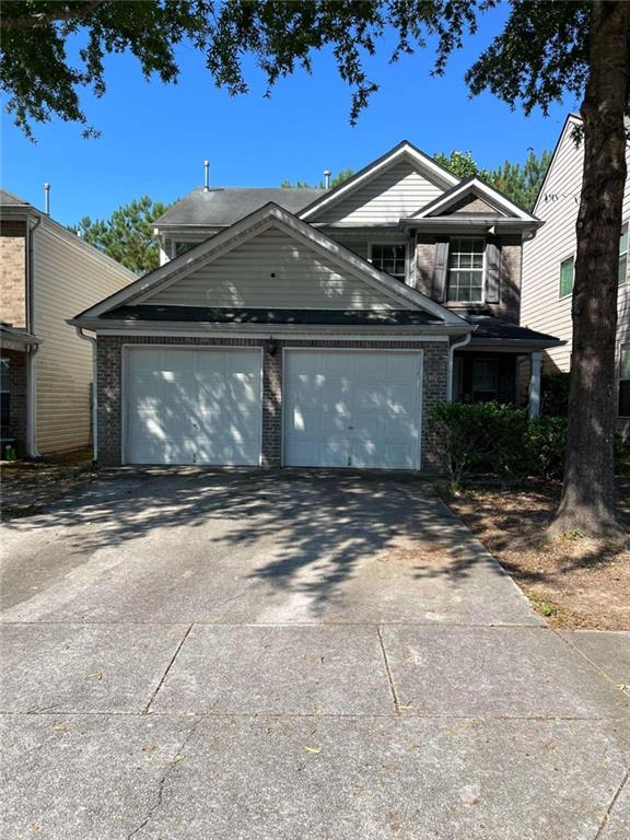 front facade with a garage