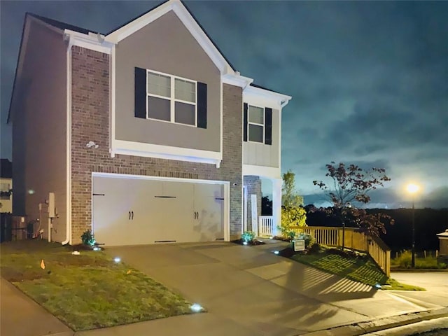 view of front of property featuring a garage