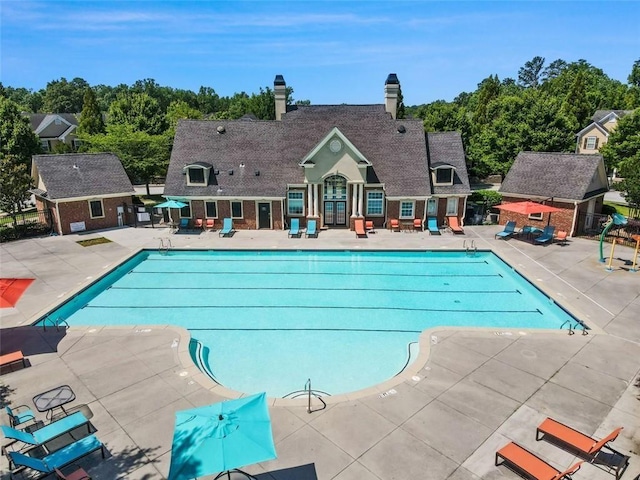 view of pool with a patio