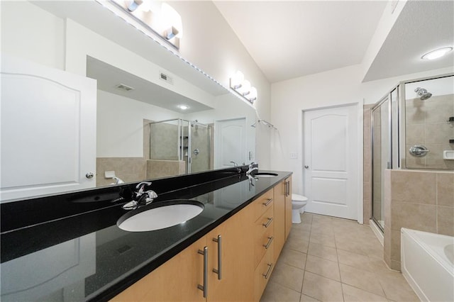 390 17th St NW Unit 2053, Atlanta, GA 30363 - full bath featuring double vanity, tile patterned floors, a stall shower, and a garden tub