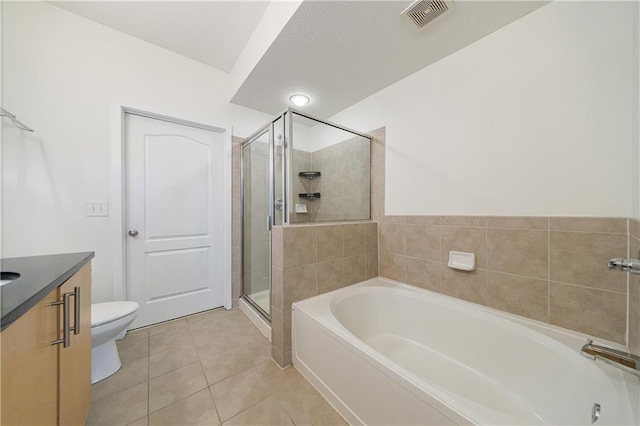 390 17th St NW Unit 2053, Atlanta, GA 30363 - full bath with a bath, vanity, a shower stall, and tile patterned flooring