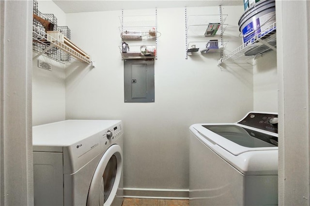 390 17th St NW Unit 2053, Atlanta, GA 30363 - washroom featuring electric panel and washer and clothes dryer