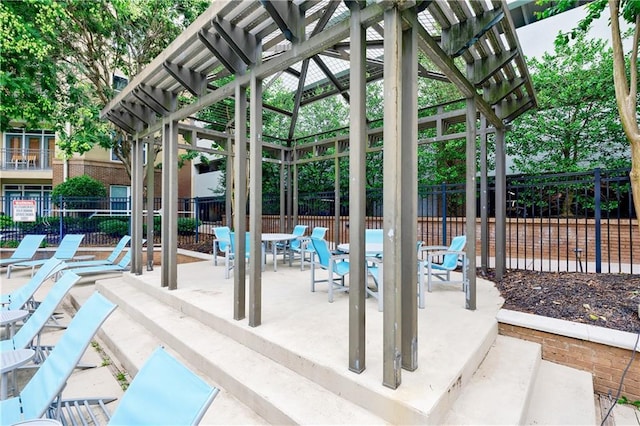 390 17th St NW Unit 2053, Atlanta, GA 30363 - view of patio / terrace with a pergola and outdoor dining area