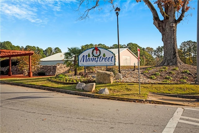 view of community sign