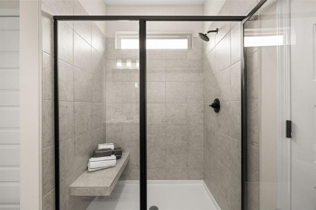 full bathroom featuring a shower stall