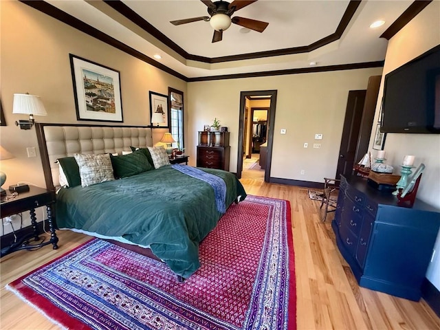 136 Timothy Park Ln, Athens, GA 30606 - bedroom with ornamental molding, a raised ceiling, light wood-type flooring, baseboards, and ceiling fan