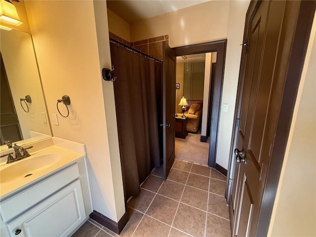 136 Timothy Park Ln, Athens, GA 30606 - bathroom with vanity, baseboards, a shower with shower curtain, and tile patterned flooring