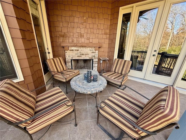 136 Timothy Park Ln, Athens, GA 30606 - view of patio / terrace with a brick fireplace and french doors