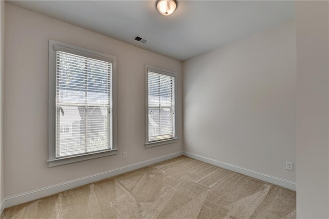 view of carpeted spare room