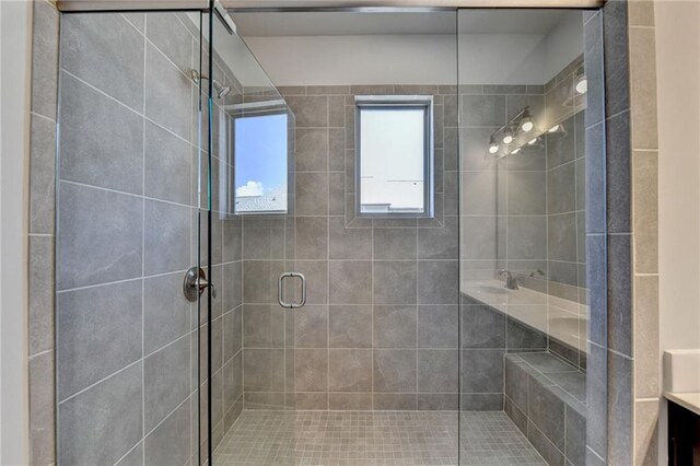 bathroom with vanity and walk in shower